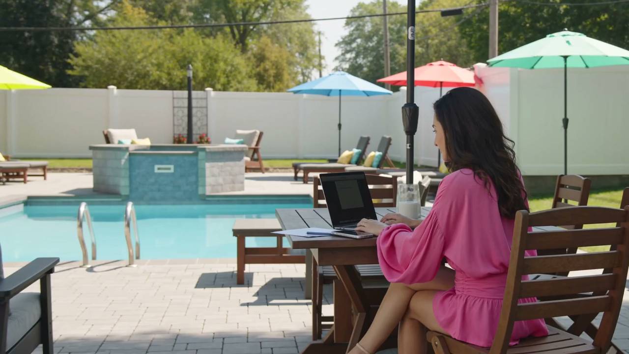 Whitney Belmonte working at an outdoor desk